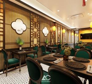 Omina Hanoi Hotel & Travel tesisinde bir restoran veya yemek mekanı