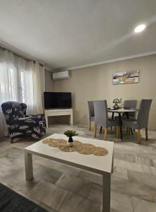 TV a/nebo společenská místnost v ubytování APARTAMENTO VERA COAST 123