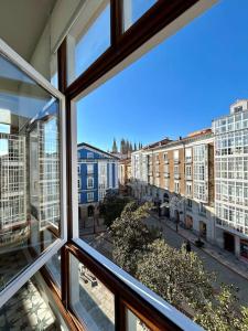 a view from an office window of a city street at Los Magnolios de Laín Calvo in Burgos