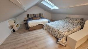Una cama o camas en una habitación de Gite Urbain - Bubble