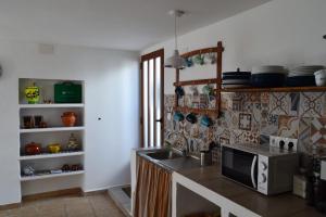 A kitchen or kitchenette at Casa del Arrabal