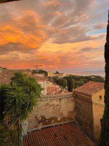 a view of a city from the roof of a building at La Brigandine in Bormes-les-Mimosas