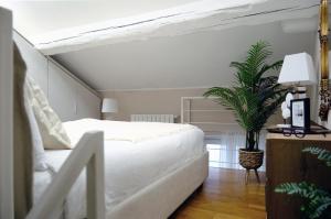 Posteľ alebo postele v izbe v ubytovaní ComeCasa Loft in Porta Romana near policlinico mangiagalli