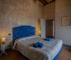 Postel nebo postele na pokoji v ubytování Casa il Castello