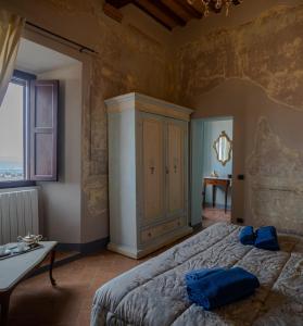 Postel nebo postele na pokoji v ubytování Casa il Castello