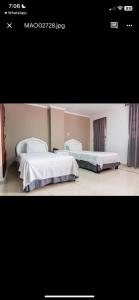 Postel nebo postele na pokoji v ubytování Hotel Suite Santa Rosa