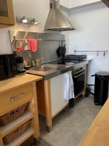 Kuchyň nebo kuchyňský kout v ubytování Beau studio rénové, vue exceptionnelle Mer-Dune