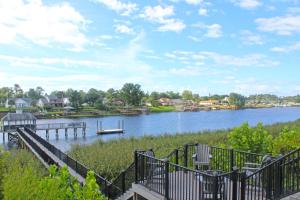 a view of a river with a dock at Waterway Village by Palmetto Vacations in Myrtle Beach