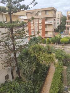 an aerial view of a building with trees and buildings at المعمورة الشاطئ بالاسكندرية شارع سيف وانلي in Alexandria