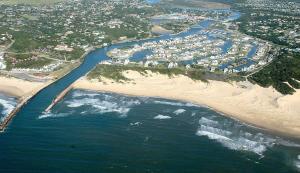 an aerial view of a beach and a harbor at A Villa de Mer Guesthouse in Port Alfred