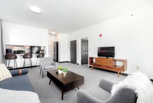 Modern 1BR 1 and a half BA CWE condo with parking CozySuites
