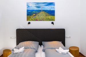 Postel nebo postele na pokoji v ubytování Berg Fux - 1-Raum Apartment Alex der Hase
