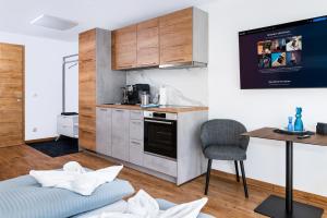 Kuchyň nebo kuchyňský kout v ubytování Berg Fux - 1-Raum Apartment Alex der Hase