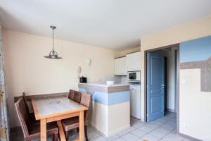 Η κουζίνα ή μικρή κουζίνα στο Les Maisons de Belle Dune - maeva Home - Maison 3 pièces 6 pers Sélection MAE-1398 +6 φωτογραφίες