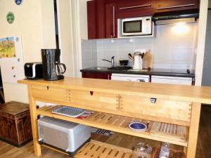 Kuchyň nebo kuchyňský kout v ubytování Résidence Pre De Camille - Spacieux appartement avec balcon, terrasse et garage proche du centre de Barèges MAE-8664