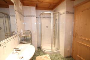 a bathroom with a shower and a sink at Ferienwohnung Königsleiten 37 - Top 1 in Königsleiten