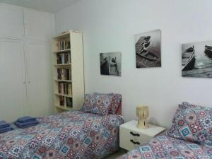 Ένα ή περισσότερα κρεβάτια σε δωμάτιο στο Spacious house in Telde with modern comfort