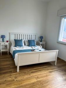 Postel nebo postele na pokoji v ubytování Appartamenti Calliope