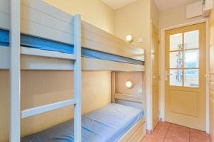 Łóżko lub łóżka w pokoju w obiekcie Les Issambres Corniche - maeva Home - Appartement 2 pièces 5 personnes Confort MAE-1353