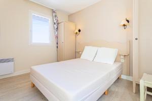 Posteľ alebo postele v izbe v ubytovaní Les Issambres Bellevue - maeva Home - Appartement 2 pièces 6 personnes Confort MAE-1365 + 7 fotografií