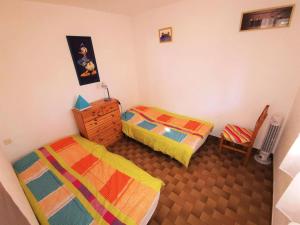 A bed or beds in a room at Résidence Maisons Des Sables 4 - 3 Pièces 6 couchages PORT LEUCATE. Réf: 2MS4_64 MAE-4924