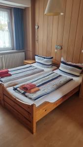 Postel nebo postele na pokoji v ubytování Edeltraut Behring Susi