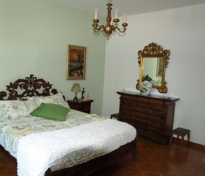 Postel nebo postele na pokoji v ubytování B&B Vigneto Pardom