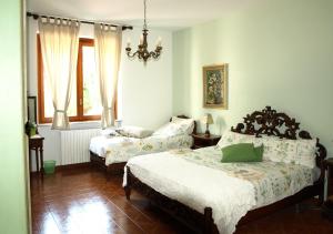 Postel nebo postele na pokoji v ubytování B&B Vigneto Pardom