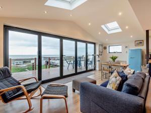 a living room with a view of the ocean at 2 Bed in Seasalter WCC05 in Seasalter