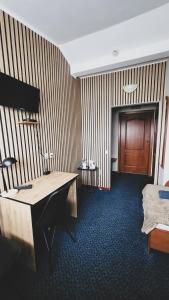 Posteľ alebo postele v izbe v ubytovaní Hotel Na Wzgórzu