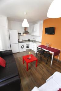 Η κουζίνα ή μικρή κουζίνα στο Arce apartamentos