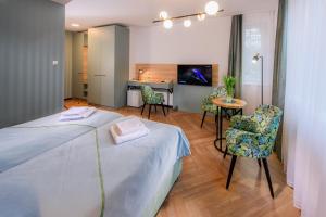 Posteľ alebo postele v izbe v ubytovaní Marta Medical + 19 fotografií