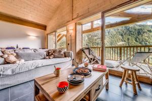 Istumisnurk majutusasutuses Résidence Les Nouveaux Alpages - Appartement 4 avec accès au SPA MAE-6664