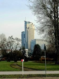 a view of a city with a tall building at Gdynia Batory in Gdynia