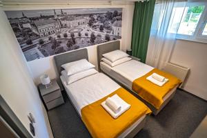 Postel nebo postele na pokoji v ubytování KM therooms BJELOVAR