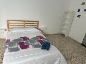 A bed or beds in a room at Apartamento A San Jose de los Llanos