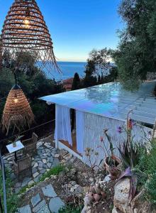 a view of a swimming pool with a table at Luxury Villa Ciao Cocoa in Grimaldi