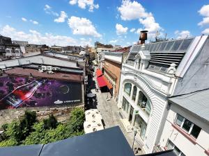 an overhead view of a city with a building at Stil Old Town Boutique Hotel in Bucharest