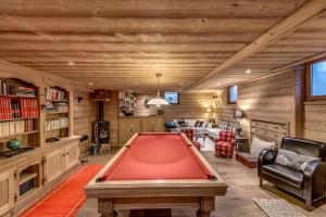 a billiard room with a red pool table at Chalet Alpaga - Chalets pour 12 Personnes MAE-7864 in Champagny-en-Vanoise