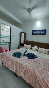 Voodi või voodid majutusasutuse UNiTY MADHAV HOMESTAY toas