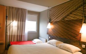 Postel nebo postele na pokoji v ubytování Hotel ibis Dijon Centre Clemenceau