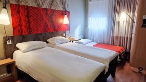 Postel nebo postele na pokoji v ubytování Hotel ibis Dijon Centre Clemenceau