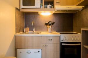 Kuchyňa alebo kuchynka v ubytovaní Le Domaine De Cramphore - maeva Home - Appartement 2 Pièces 4 Personnes - Confort MAE-8426