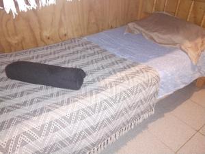 Cama o camas de una habitación en Cabañas del mar