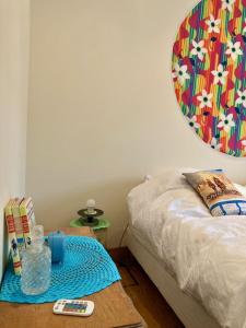 En eller flere senge i et værelse på Maison de village - MadreMia ! A proximité de Bagnoles de l'Orne