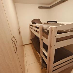 Postel nebo postele na pokoji v ubytování Les Ecuries d'Emilie