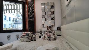 Ein Bett oder Betten in einem Zimmer der Unterkunft Terrasa de Mercado Central