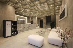 TV a/nebo společenská místnost v ubytování H Avenue Hotel Sangmu Branch