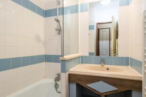 Kúpeľňa v ubytovaní La Résidence du Golf - maeva Home - Appartement 2 pièces 5 personnes - Confort MAE-5442 + 15 fotografií
