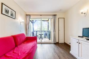 Televízia a/alebo spoločenská miestnosť v ubytovaní La Résidence du Golf - maeva Home - Appartement 2 pièces 4 personnes - Confort MAE-5448